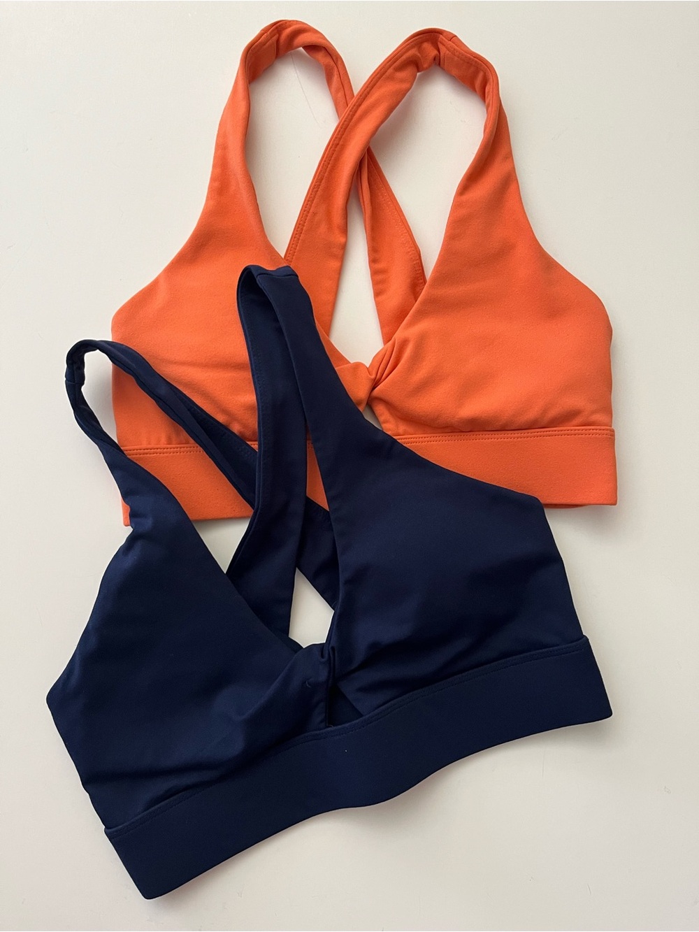 Fabletics | Dual-Pack Cross-Back Sports Bras in Orange & Navy